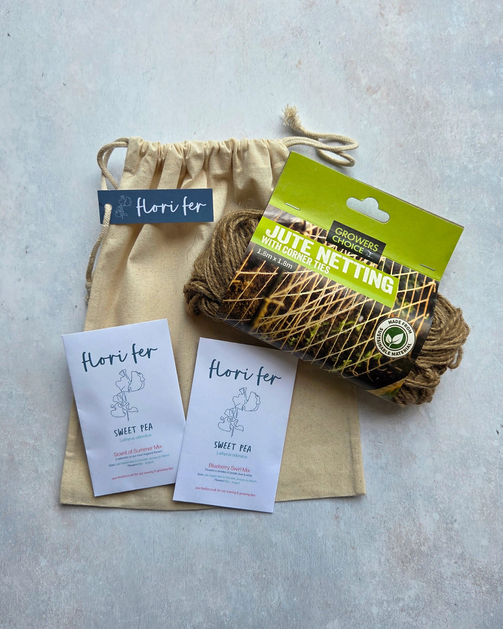 A Sweet Pea starter kit including two packs of Sweet Pea seeds with jute netting and a cotton gift bag